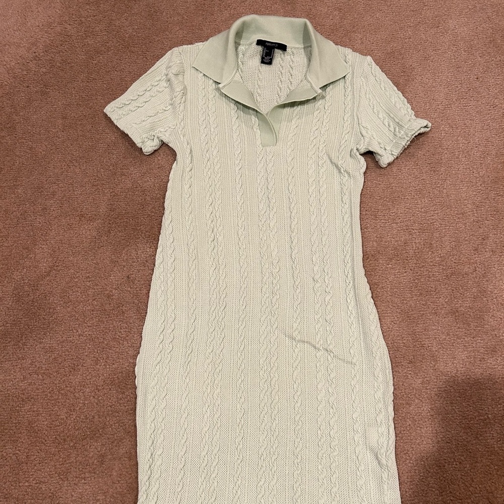 Women’s sweater dress. Light green